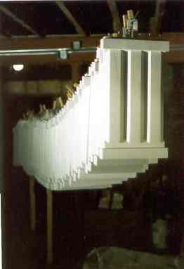 Triglyphs being assembled and installed